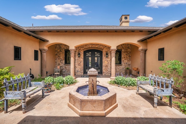 view of patio / terrace featuring french doors