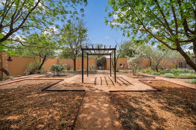 view of play area with a fenced backyard