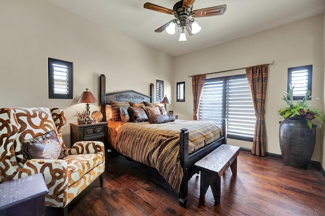 bedroom featuring hardwood / wood-style floors, ceiling fan, and baseboards
