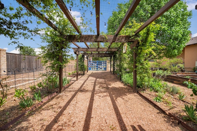 view of patio / terrace featuring a fenced backyard and a pergola