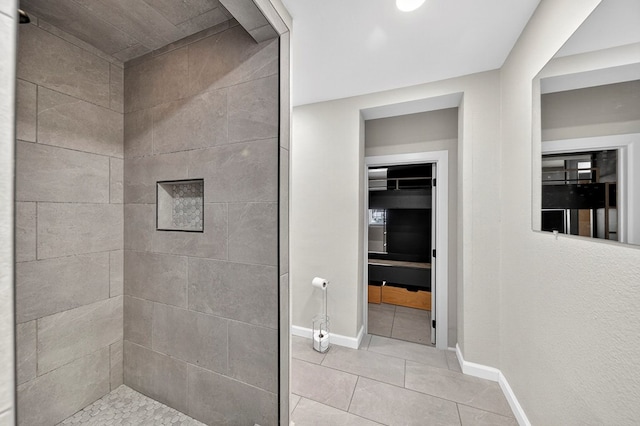 2502 W Cuthbert Ave, Midland, TX 79701 - bathroom featuring tile patterned flooring and tiled shower