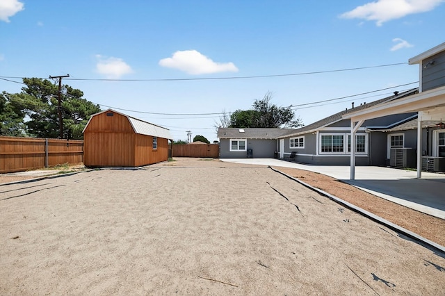 2502 W Cuthbert Ave, Midland, TX 79701 - fenced backyard with a storage shed and a patio area