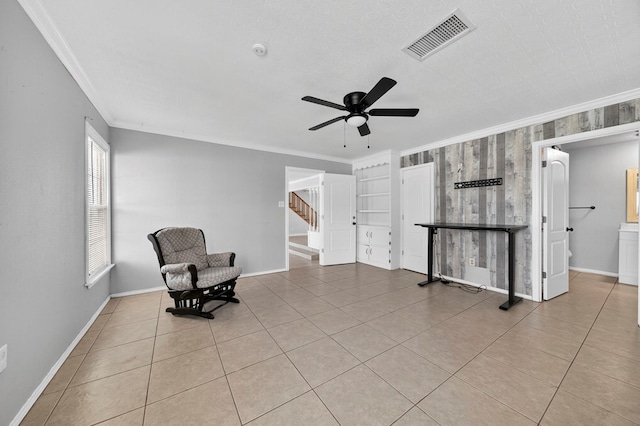 2502 W Cuthbert Ave, Midland, TX 79701 - unfurnished room with ornamental molding, a ceiling fan, stairs, and light tile patterned floors