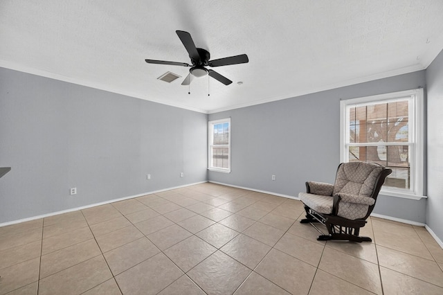 2502 W Cuthbert Ave, Midland, TX 79701 - unfurnished room with light tile patterned floors, crown molding, and ceiling fan