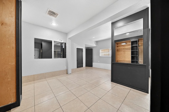 2502 W Cuthbert Ave, Midland, TX 79701 - spare room with tile patterned flooring and recessed lighting