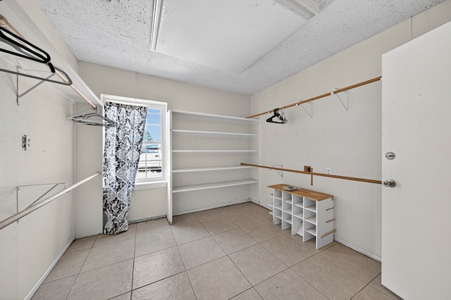 2502 W Cuthbert Ave, Midland, TX 79701 - walk in closet featuring tile patterned flooring