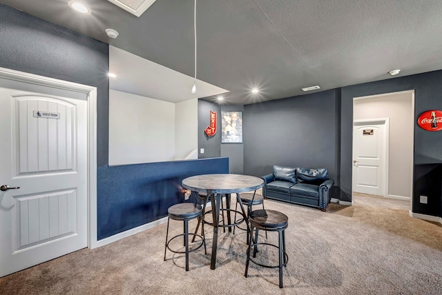 806 Revere Pl, Midland, TX 79706 - carpeted dining area with baseboards, recessed lighting, and a textured ceiling