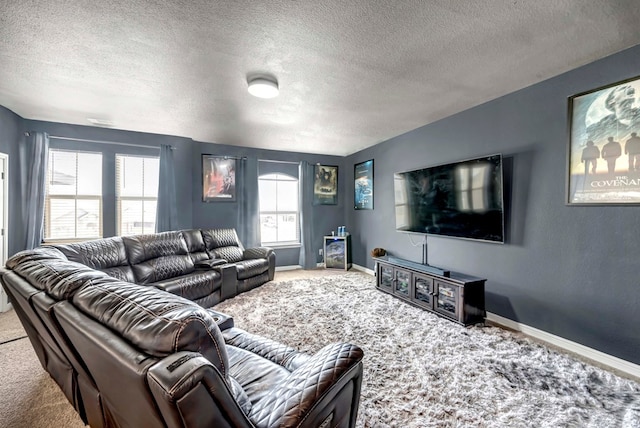 806 Revere Pl, Midland, TX 79706 - carpeted living room with a textured ceiling and baseboards
