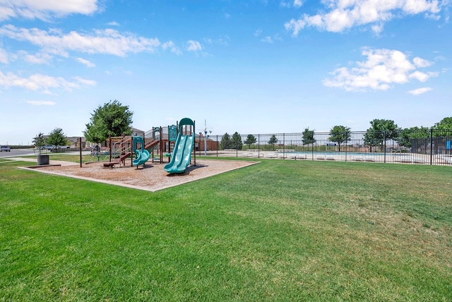 806 Revere Pl, Midland, TX 79706 - community playground with a lawn, fence, and a fenced in pool