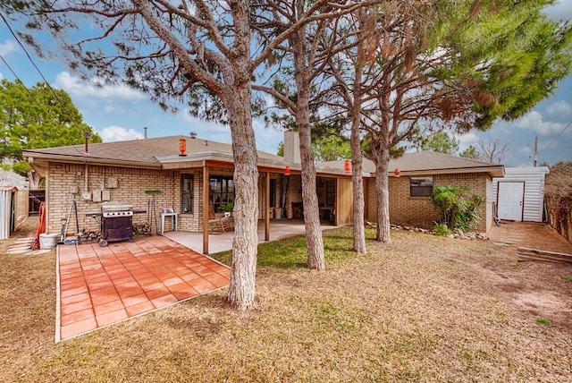 back of house featuring a patio area