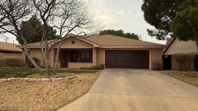 single story home with a garage