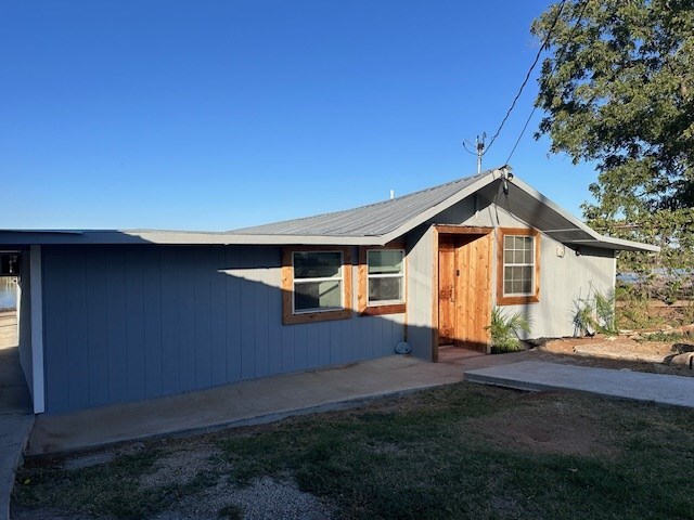 view of home's exterior with a patio