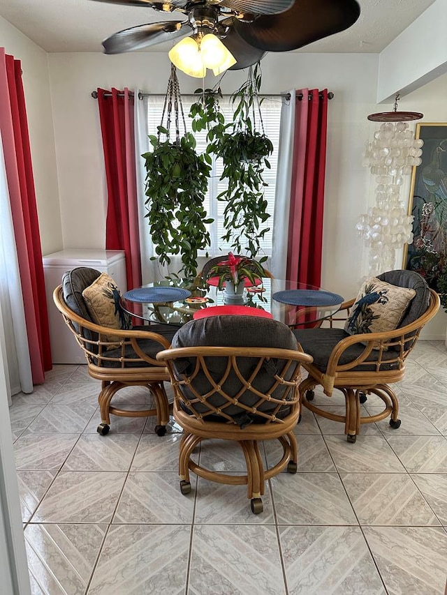 dining room with a ceiling fan