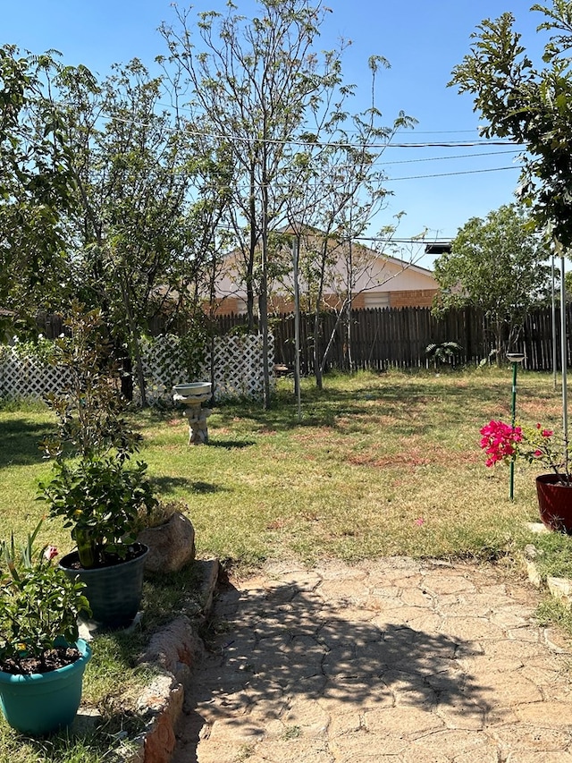 view of yard featuring fence