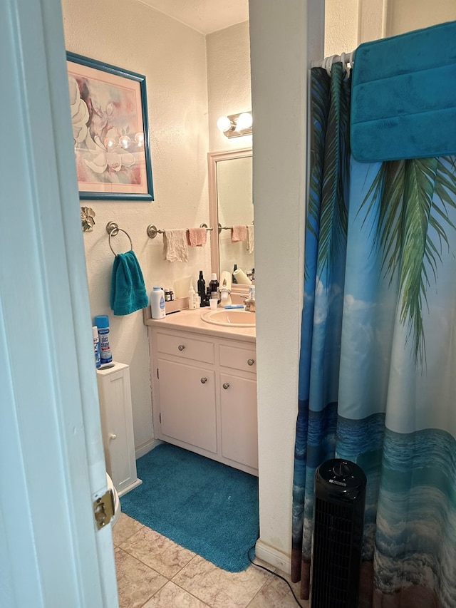 bathroom featuring vanity and tile patterned floors