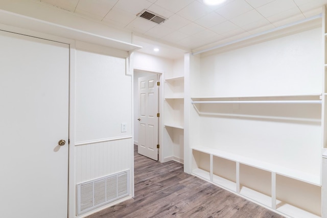 interior space featuring visible vents and wood finished floors