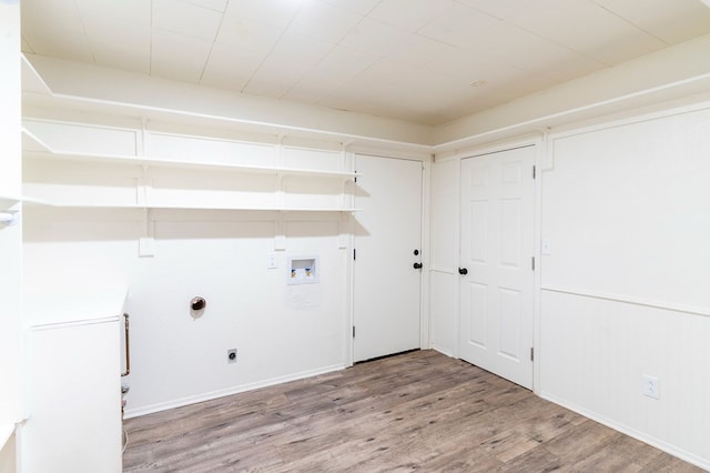 washroom with laundry area, hookup for a gas dryer, wood finished floors, hookup for a washing machine, and electric dryer hookup