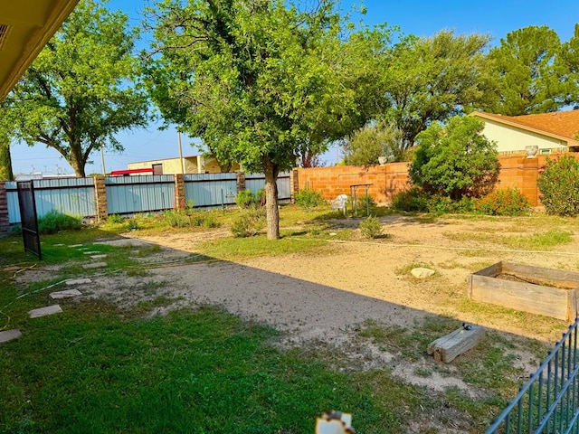 1512 W 14th St, Fort Stockton, TX 79735 - fenced backyard with a garden