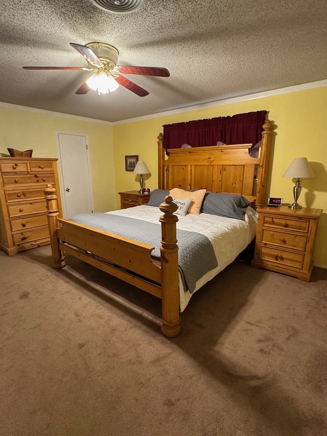 1512 W 14th St, Fort Stockton, TX 79735 - bedroom with light carpet, ceiling fan, ornamental molding, and a textured ceiling