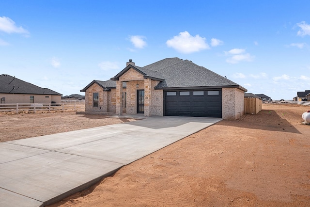 view of front of house with a garage