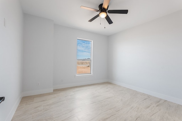 unfurnished room with ceiling fan