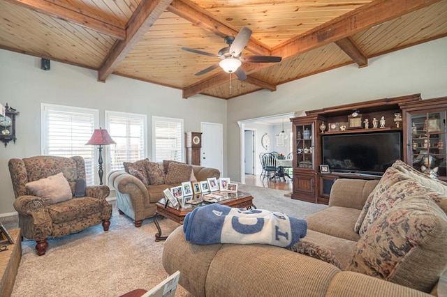 4704 Elma Dr, Midland, TX 79707 - living room featuring wooden ceiling with exposed beams, ceiling fan, and carpet floors