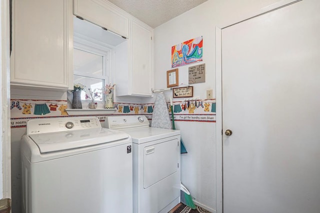 4704 Elma Dr, Midland, TX 79707 - laundry room with cabinet space, washer and clothes dryer, and a textured ceiling