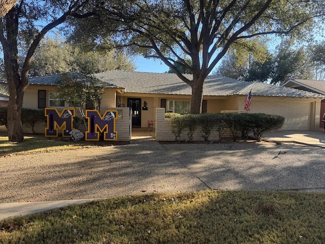 ranch-style house with a garage