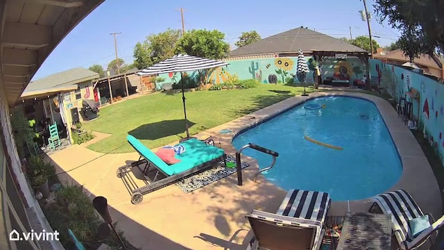 pool with a gazebo, a yard, a fenced backyard, and a patio area