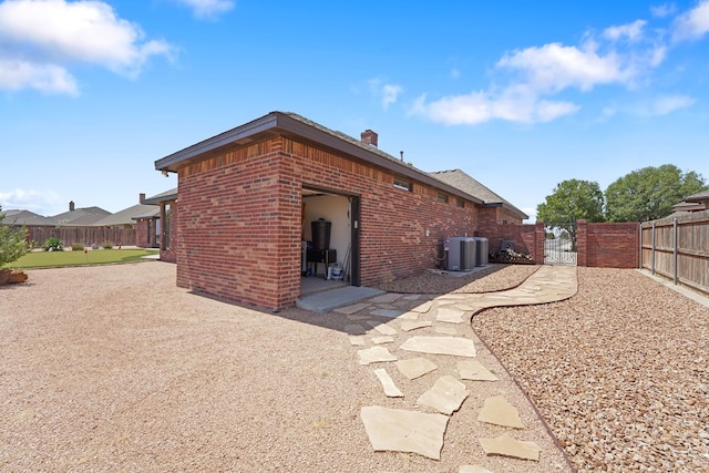 view of property exterior with central air condition unit