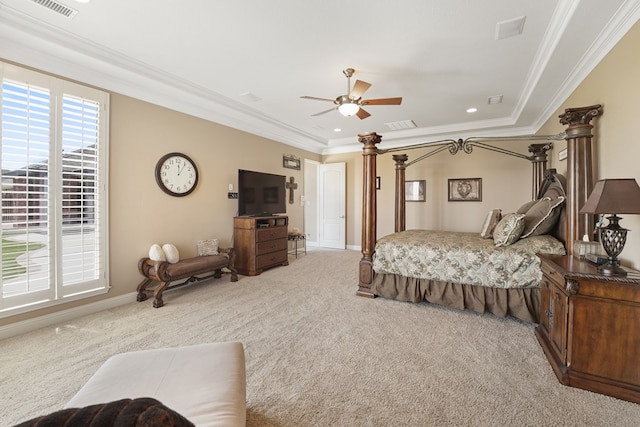 bedroom featuring light carpet, ceiling fan, and crown molding