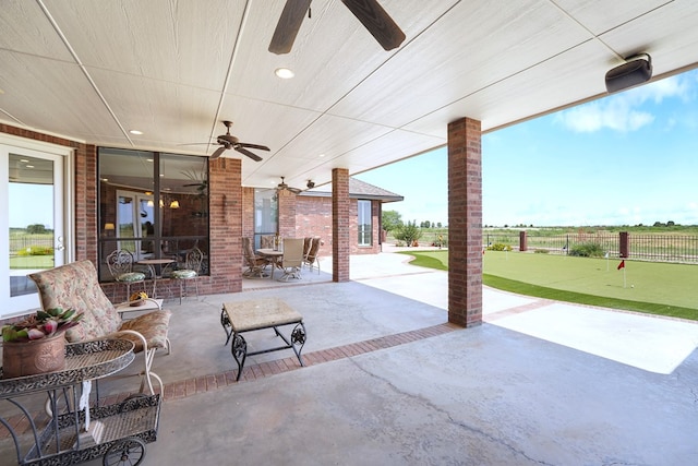 view of patio with ceiling fan