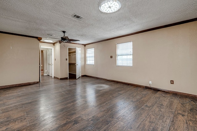 3608 S County Rd 1195, Midland, TX 79706 - unfurnished room with crown molding, wood finished floors, ceiling fan, a textured ceiling, and baseboards