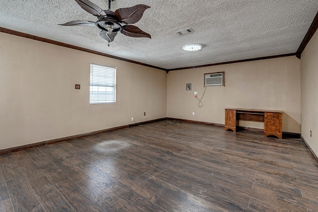 3608 S County Rd 1195, Midland, TX 79706 - spare room with ornamental molding, wood finished floors, ceiling fan, a wall mounted air conditioner, and a textured ceiling