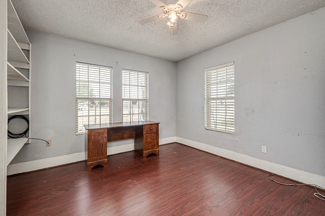 3608 S County Rd 1195, Midland, TX 79706 - unfurnished office with dark wood-type flooring, a textured ceiling, ceiling fan, and baseboards