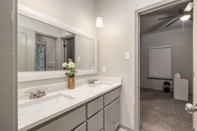 bathroom featuring vanity and ceiling fan