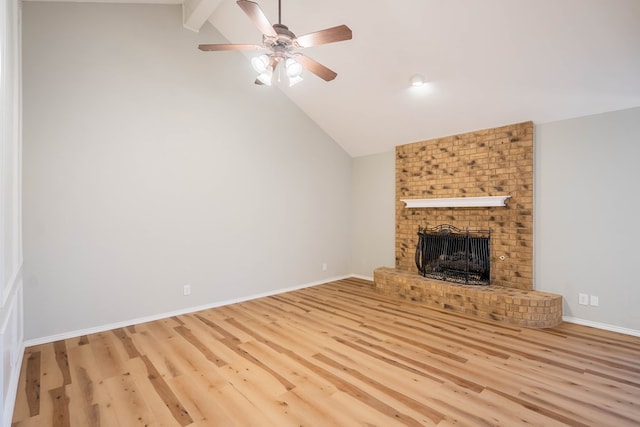 unfurnished living room featuring ceiling fan, a fireplace, wood finished floors, and baseboards