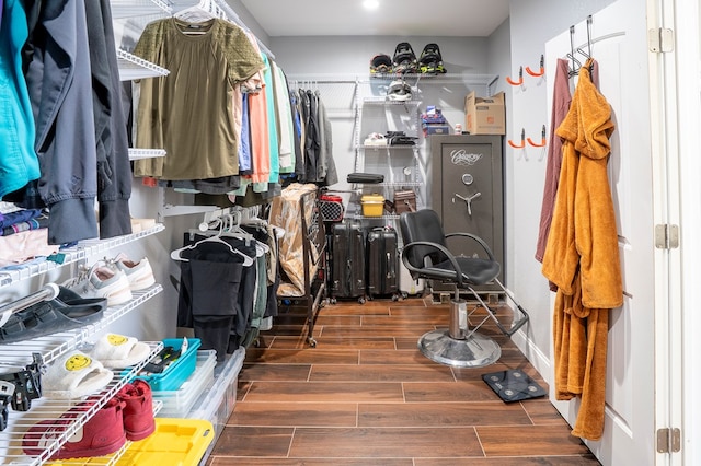 spacious closet featuring wood finish floors