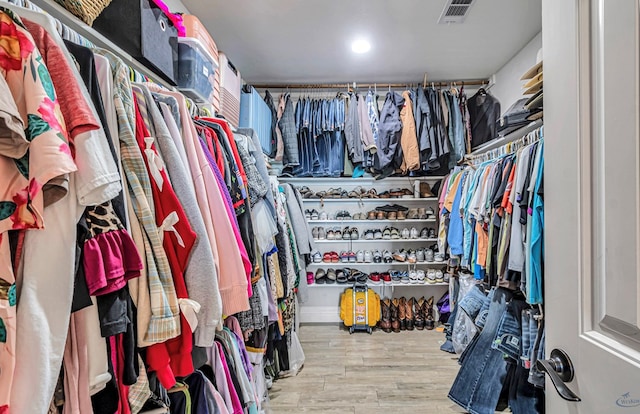 6811 W County Rd 41, Midland, TX 79707 - walk in closet with wood finished floors