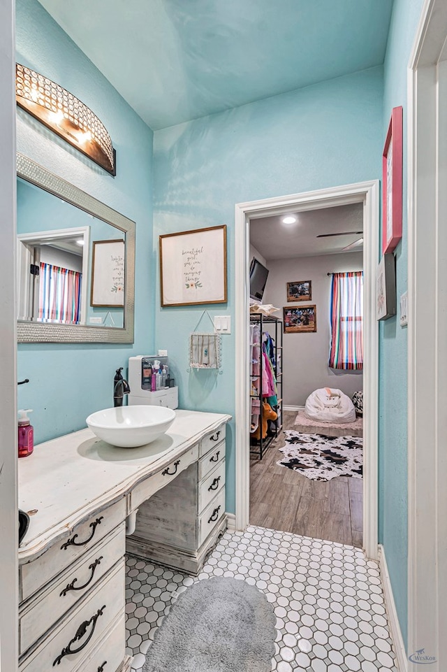 6811 W County Rd 41, Midland, TX 79707 - bathroom with vanity and baseboards