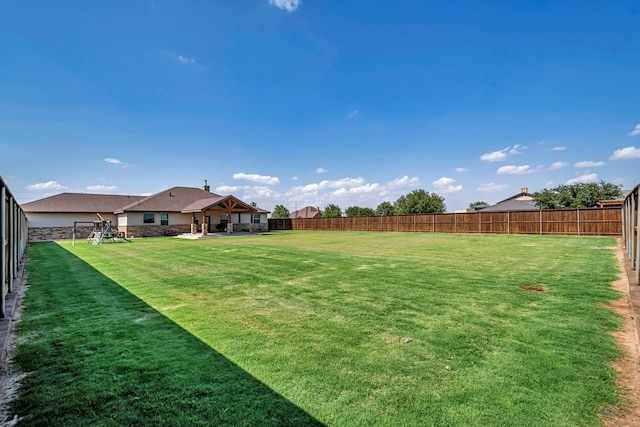 6811 W County Rd 41, Midland, TX 79707 - view of yard featuring a patio