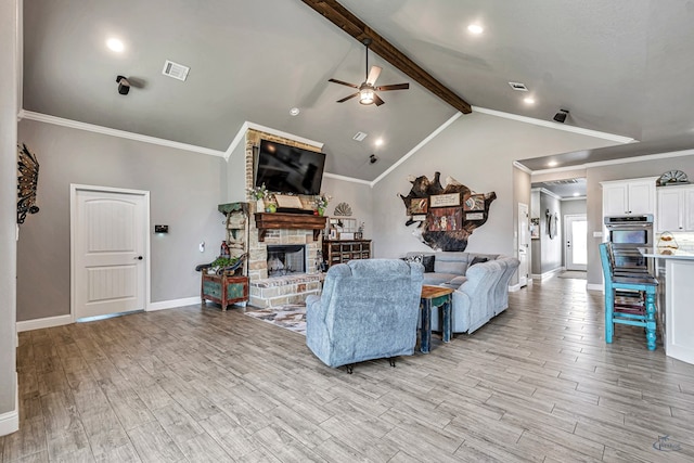 6811 W County Rd 41, Midland, TX 79707 - living room with ceiling fan, light wood-type flooring, a stone fireplace, baseboards, and recessed lighting