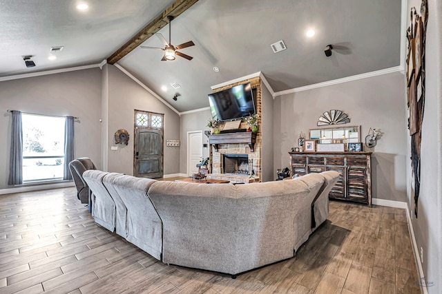 6811 W County Rd 41, Midland, TX 79707 - living room featuring a ceiling fan, wood finished floors, a stone fireplace, baseboards, and recessed lighting
