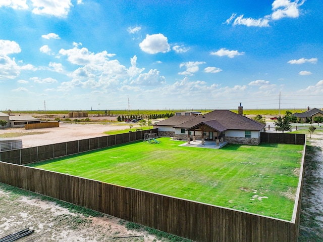 6811 W County Rd 41, Midland, TX 79707 - view of yard featuring a playground and a patio