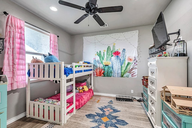 6811 W County Rd 41, Midland, TX 79707 - bedroom featuring wood finished floors, baseboards, ceiling fan, and recessed lighting