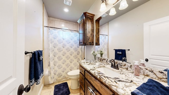 bathroom featuring toilet, tile patterned floors, visible vents, vanity, and shower / tub combo with curtain