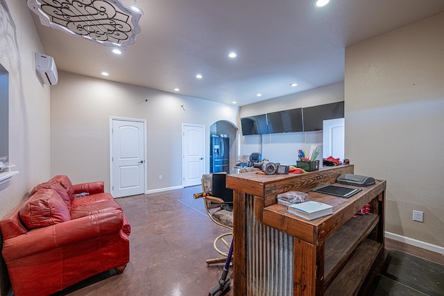 office area with recessed lighting, baseboards, arched walkways, concrete flooring, and a wall mounted AC