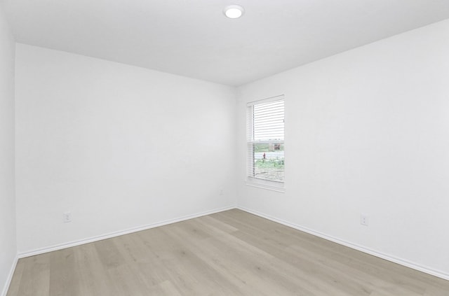 804 Bella Bvd, Coleman, TX 76834 - unfurnished room with light wood-style floors and baseboards