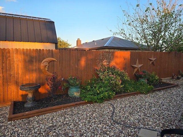 view of yard featuring a fenced backyard