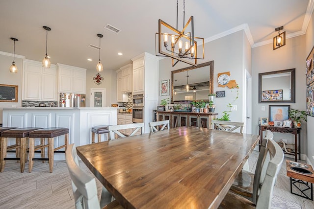 dining area featuring recessed lighting, visible vents, crown molding, and ceiling fan